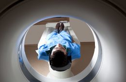 Photo of a man in an MRI unit