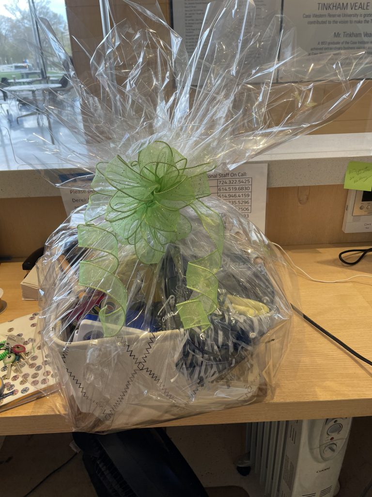 Photo of a gift basket wrapped in clear plastic