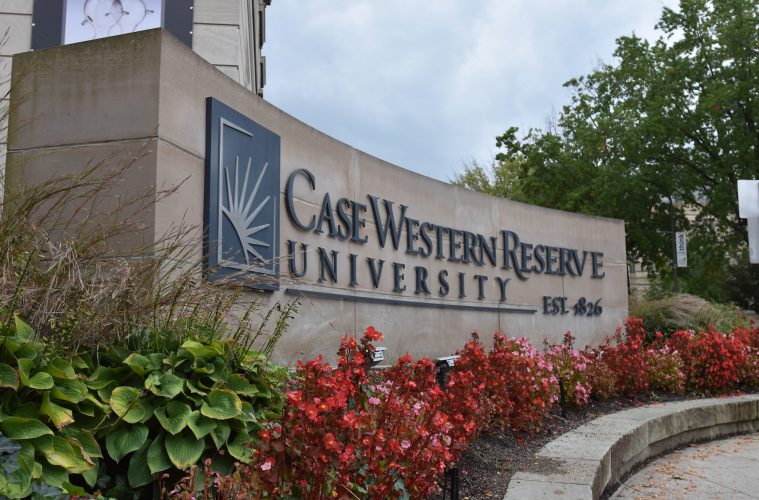 Photo of the CWRU sign on the corner of Euclid Avenue and Adelbert Road