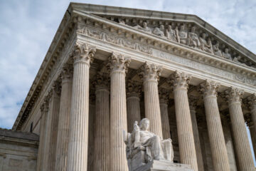 A view of the front portico of the United States Supreme Court building in Washington, DC.