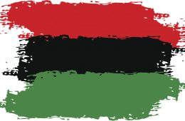painted stripes in red, black and green rows to recognize Juneteenth
