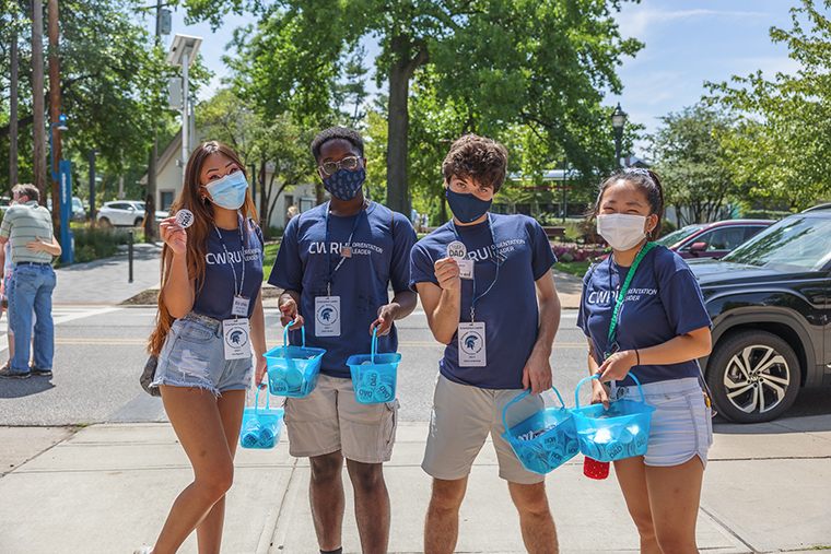 A group of CWRU students together wearing masks