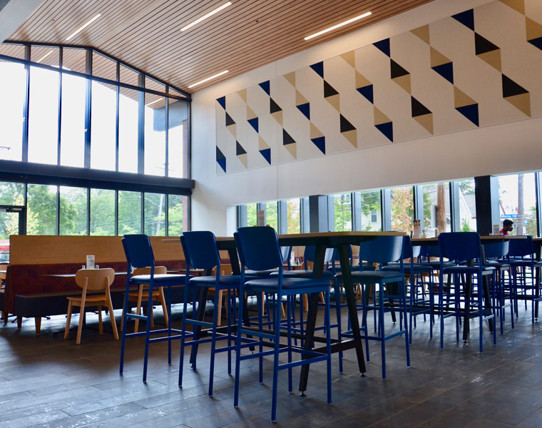 Photo of a seating area in the redesigned Fribley Commons with high-top stools