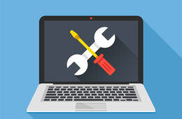 Computer maintenance vector with images of a wrench and screwdriver on a laptop screen