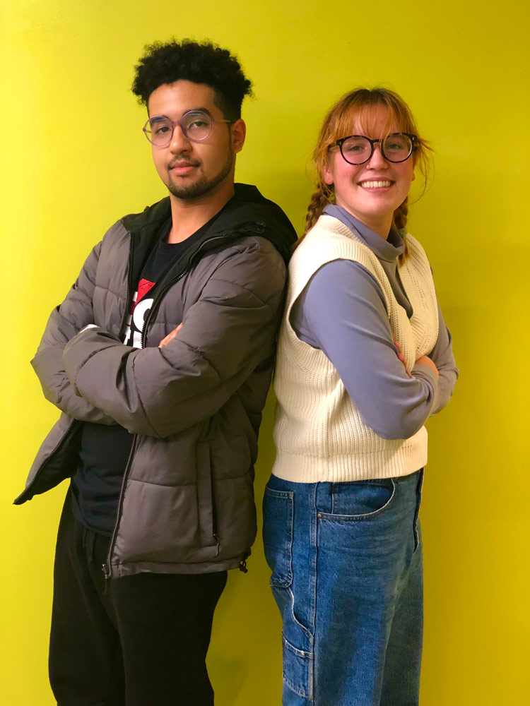 Photo of Ryan Baladez and Sarah Berger together against a bright yellow background