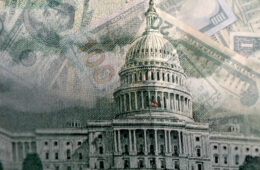 dollar bills superimposed behind the whitehouse