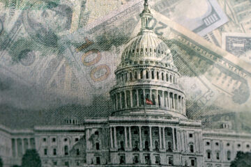 dollar bills superimposed behind the whitehouse