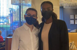 Photo of Caroline Kuntzman and Toni Odufuye together while wearing masks