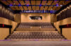 Photo of the Roe Green Theatre taken from the stage looking out at the seats