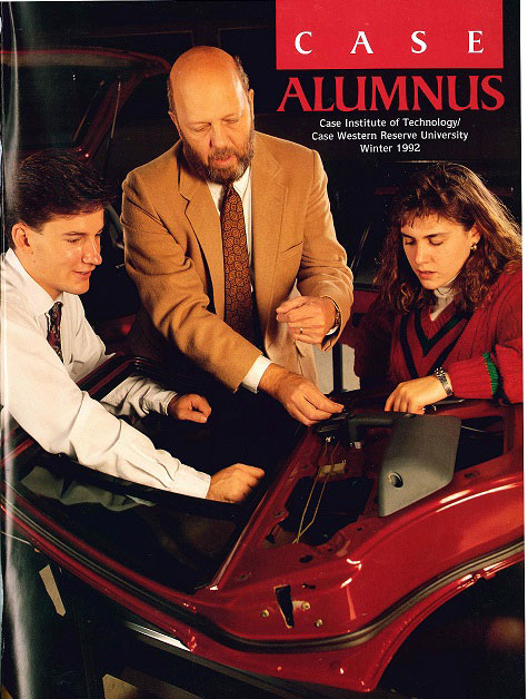 Photo of the cover of Case Alumnus from 1992 with Tom Kicher and two students working on a car