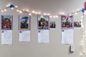 Photo of artwork and accompanying text on the wall in the Office of Multicultural Affairs