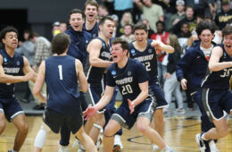 Photo of Case Western Reserve University 2022 Men's Basketball team cheers on the court after NCAA tournament win