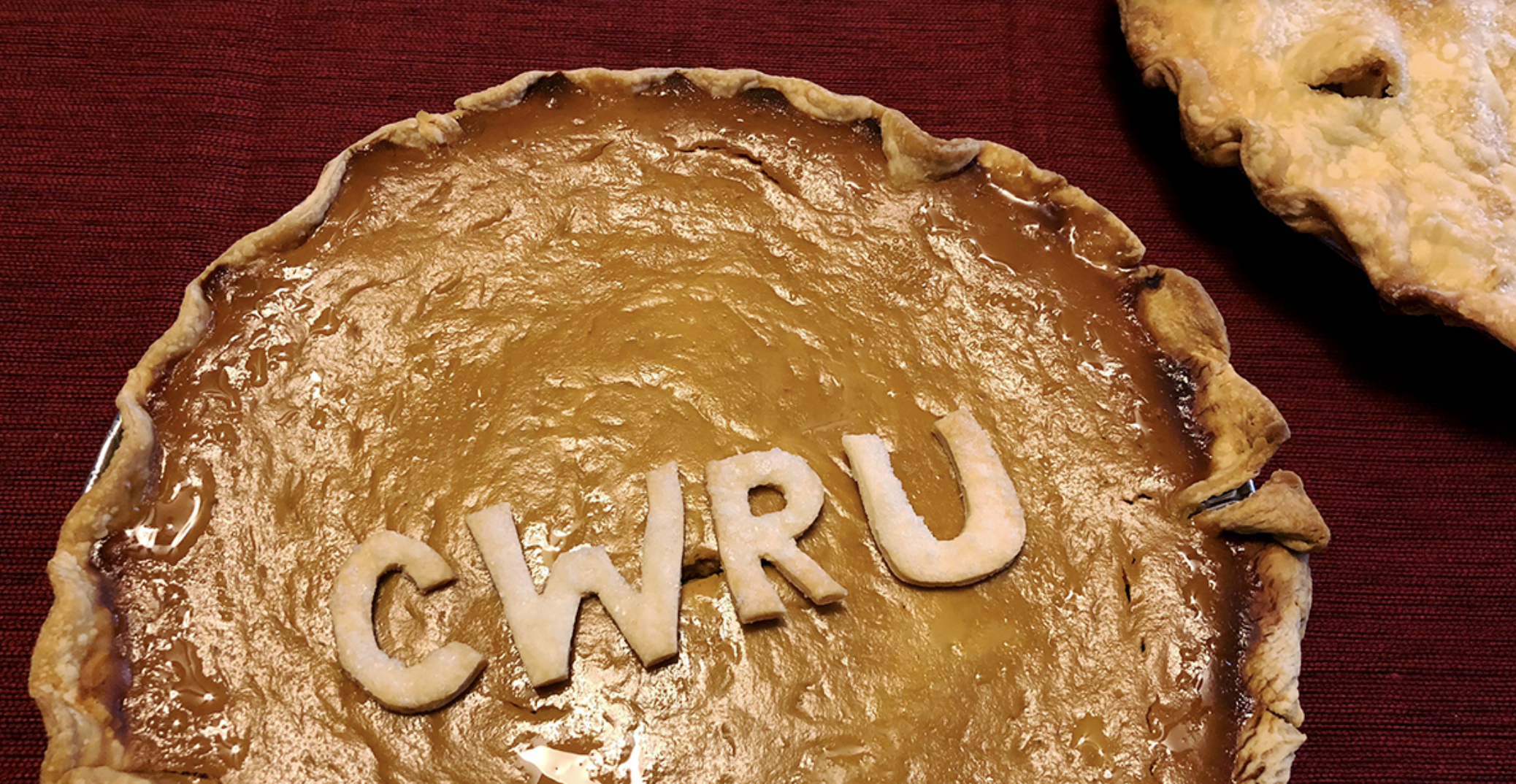 CWRU letters on a pumpkin pie