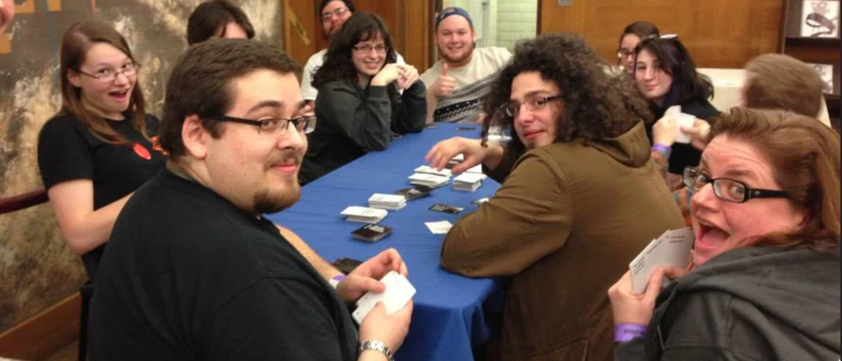 A group of attendees play a card game at the Sci-Fi Film Marathon in 2015.