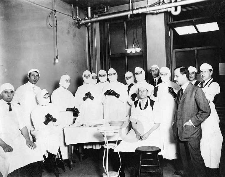 A class of medical students prepare for surgery in 1910.