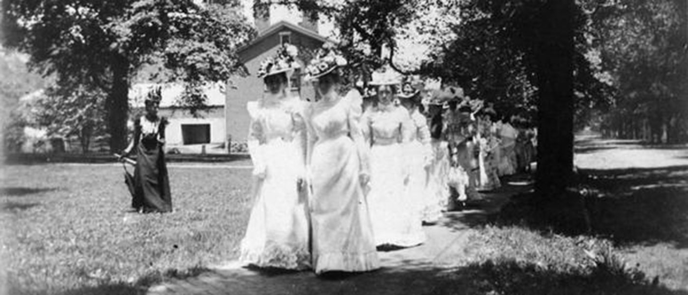 A group of graduates during a commencement procession for the College of Women in the 1800s.