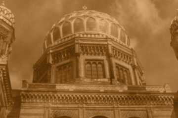 Sepia tone photo of an ornate Jewish temple