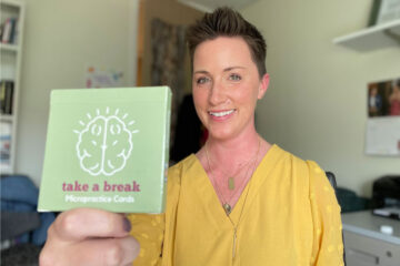 Photo of Jennifer King and her deck of Take a Break micropractice cards.