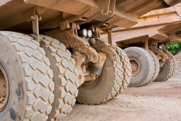 Close up photo on the tires of heavy trucks