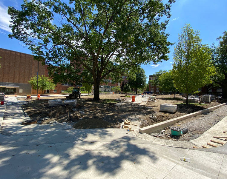 Photo showing construction underway on the Case Quad with a path being formed