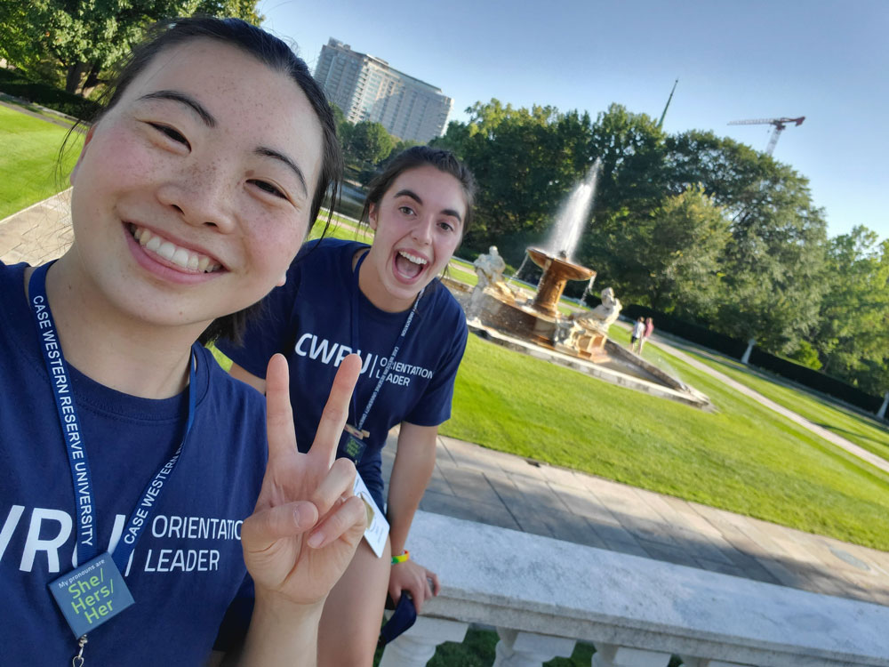 Michelle Yun and Gillian Russo pose for a selfie in front of Wade Oval