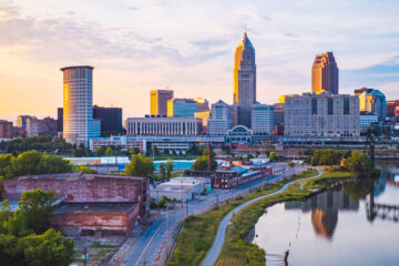 Photo of the sun rising over the Cleveland skyline