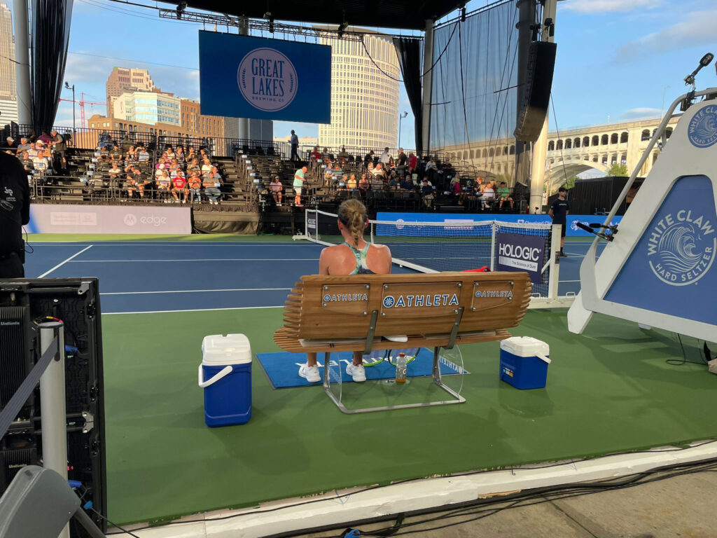 Photo of the tennis bench Jules Siegal created in action at a tournament