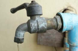 Photo of a rusted water faucet