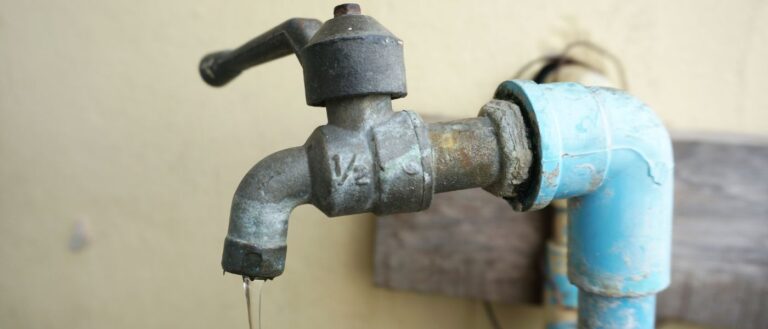Photo of a rusted water faucet