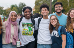 A group of diverse students smiling