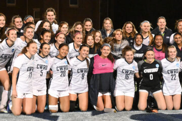 CWRU women's soccer team poses for photo following their semifinal win