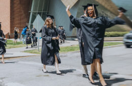 Blur shot of CWRU graduates walking outside