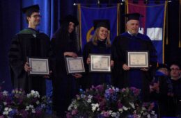 A group of John S. Diekhoff Award winners pose at commencement.