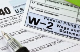 close up of 1040 and W-2 tax forms