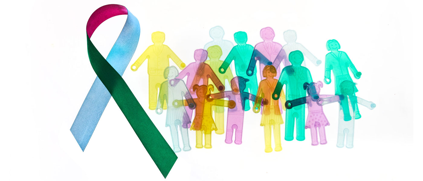 Multicolored ribbon and illustrations of differently colored people to represent the concept of rare diseases