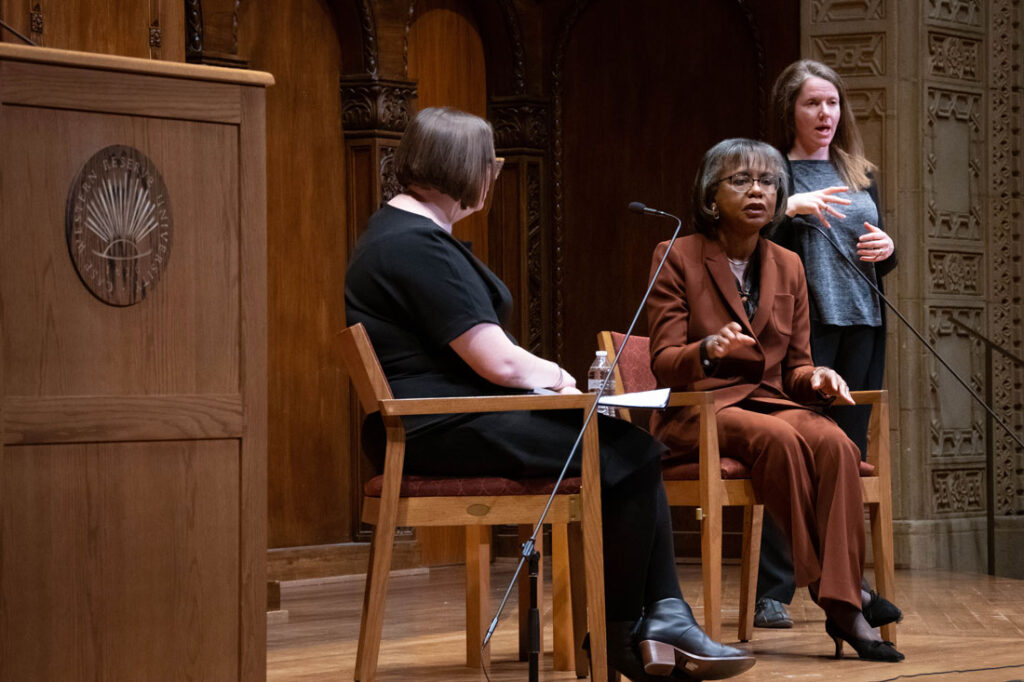 Photo of Anita Hill and Angela Clark-Taylor speak on stage