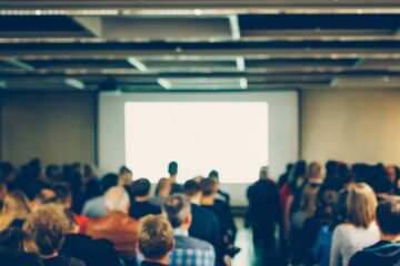 Business conference with unrecognizable audience