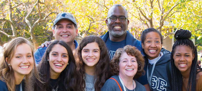 Photo of smiling legacy students and their families at CWRU.