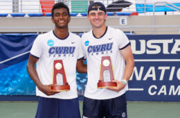 Photo of CWRU tennis players Vishwa Aduru and James Hopper holding championship trophies
