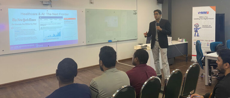 Photo of Satish Viswanath presenting a talk during his Fulbright program in Malaysia