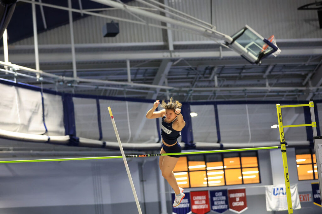 Photo of Victoria Zhao competing in a pole vaulting competition
