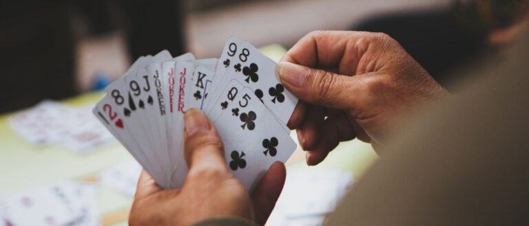 Close up of a person playing cards
