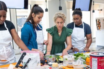 Photograph of students learning within the CWRU teaching kitchen. Photograph by Matt Shiffler