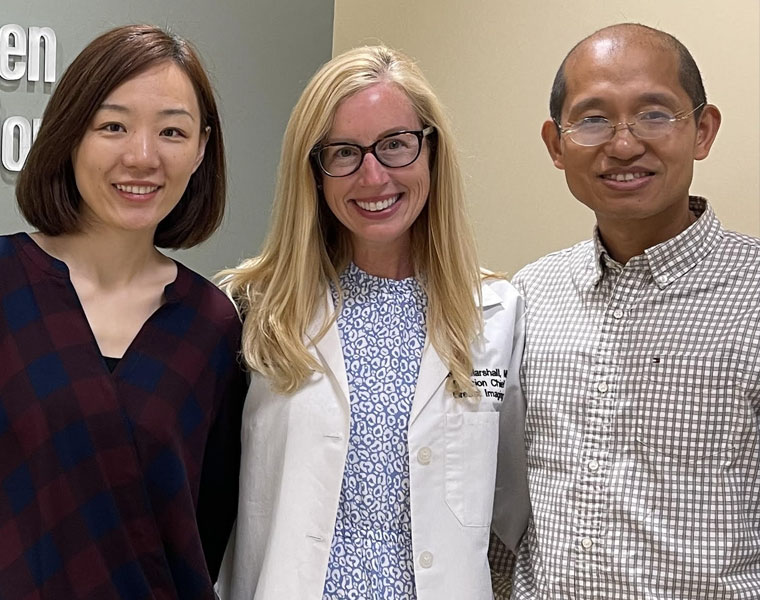 Photo of researchers Dan Ma, Holly Marshall and Yong Chen