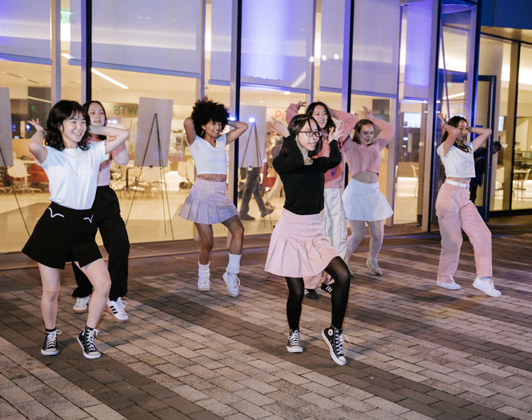 Photo of a CWRU student group performing a dance during Blue Bash