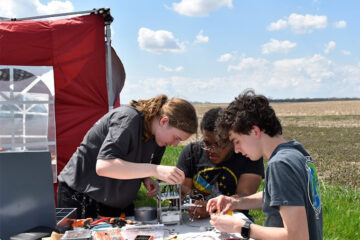 Photo of the Case Rocket Team working on a project