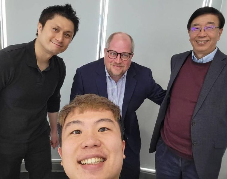 Photo of Christopher Sippel (center back) in a post-meeting selfie with colleagues at Taipei Medical University