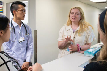 Photo of health profession students meeting at the Student Run Health Clinic