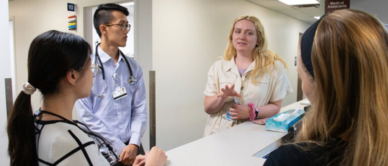 Photo of health profession students meeting at the Student Run Health Clinic