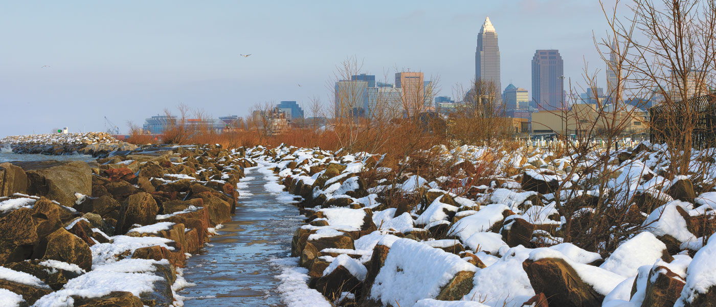 Photo of the Cleveland skyline taken from Edgewater Park where there's snow on the ground. Courtesy of Getty Images.